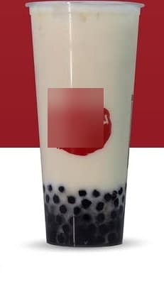 A tall Yuzu & Taro House bubble-tea cup stamped with the round red seal, full of milk tea and tapioca pearls.